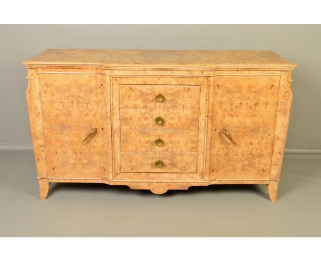 AN ART DECO BURR WALNUT SIDEBOARD, lipped top flanked by shaped front corners, central breakfront above four drawers, flanked