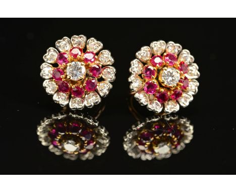 A MID TO LATE 20TH CENTURY PAIR OF RUBY AND DIAMOND ROUND CLUSTER EARRINGS, measuring approximately 16.1mm in diameter, screw