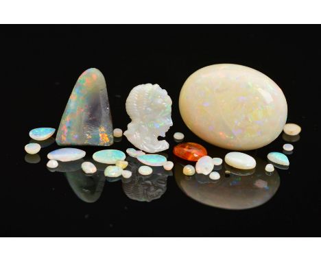 A COLLECTION OF OPALS, to include precious white cameo, piece of boulder opal, one small cabochon of fire opal and a small co