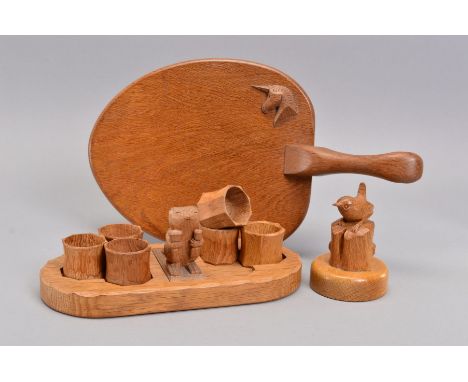 BEAVERMAN COLIN ALMACK OF SUTTON-UNDER-WHITESTONECLIFFE OAK NAPKIN RING STAND, carved with a beaver standing holding a hammer