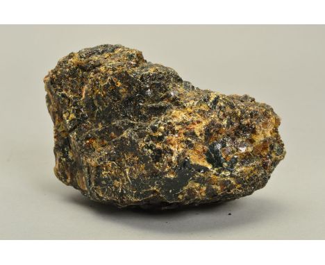 A DOMINICAN REPUBLIC ROUGH AMBER BOULDER, unpolished measuring approximately 165mm x 90mm x 75mm, weight approximately 646 gr