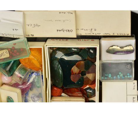 A BOX OF MIXED GEMS, to include a selection of agate panels, a large faceted rutile quartz, a jade cabochon, four small natur