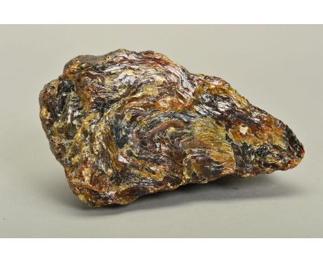 A DOMINICAN REPUBLIC ROUGH AMBER BOULDER, unpolished measuring approximately 190mm x 115mm x 85mm, weight approximately 725 g