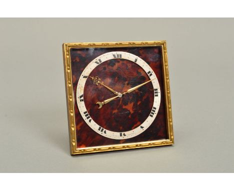 A FIRST HALF THE 20TH CENTURY SWISS BEDSIDE CLOCK, of square form, gilt metal frame, tortoiseshell dial with silvered chapter