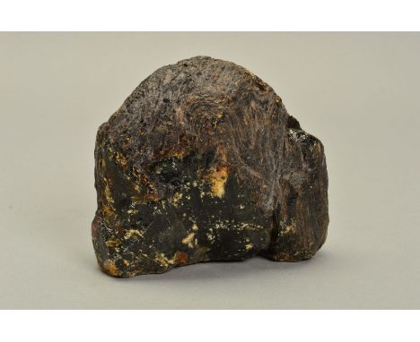 A DOMINICAN REPUBLIC ROUGH AMBER BOULDER, unpolished measuring approximately 130mm x 115mm x 50mm, weight approximately 507 g