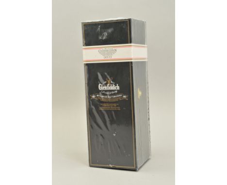 A BOTTLE OF GLENFIDDICH PURE MALT SCOTCH WHISKY, Limited Centenary Edition specially filled and sealed on Christmas Day 1986 