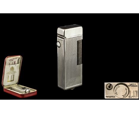 Dunhill - Swiss Made Silver Plated Roll-a-gas Lighter with Original Box and Paper. c.1960's. Height 2.5 Inches - 6.25 cms. Co