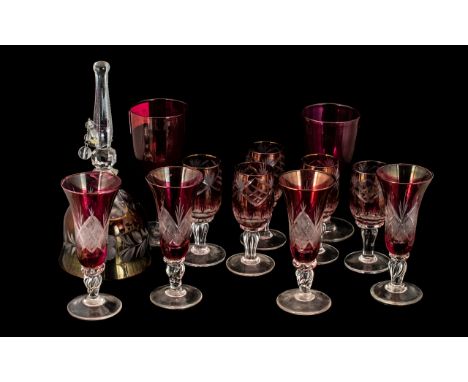 Collection of Ruby Coloured Glass, comprising a bell, four sherry glasses, five liqueur glasses, and two small wine glasses.