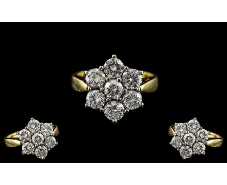 18ct Gold - Attractive 7 Stone Diamond Set Cluster Ring - Flower head Design. Full Hallmark for 750 to Interior of Shank. The