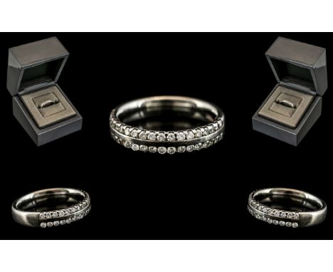 Platinum - Diamond Set Contemporary Designed Half - Eternity Ring. Marked for Platinum to Interior of Shank. Set with 40 Mode