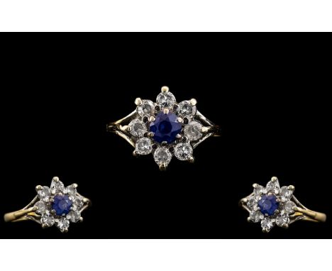 Ladies - Attractive 18ct Gold Diamond and Sapphire Set Cluster Ring - Flower head Setting. The Central Cornflower Blue Sapphi