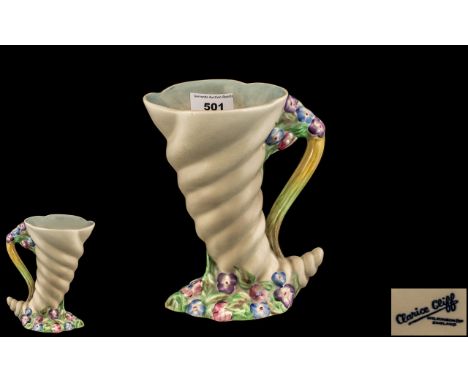 Clarice Cliff Vase, cornucopia shaped, in cream with handle and floral decoration, signed to base 'Clarice Cliff' and marked 