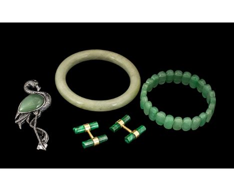 Collection of Jade Jewellery comprising a jade faceted bracelet and brooch; a bangle; and a pair of malachite cufflinks.