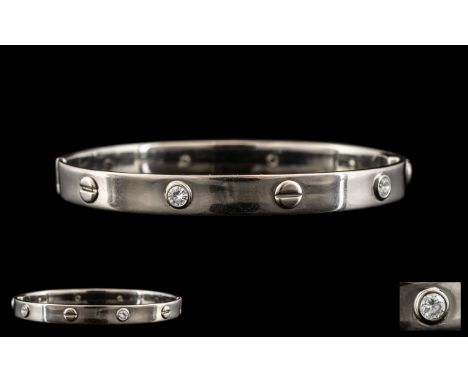 Cartier Style - 18ct White Gold Diamond Set Hinged Bangle. Marked 750. Pave Set with Two Round Brilliant Cut Diamond of Good 