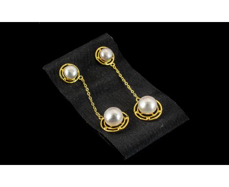 Cultured Pearl Long Drop Earrings, single fresh water white pearls set within circular, open frames of 14ct gold vermeil and 