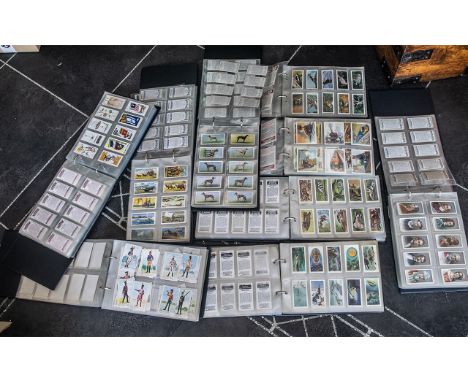 A Box Containing a Large Quantity of Cigarette Antique Cards 9 albums, part sets, cards to include Carreres Ltd glamour girls
