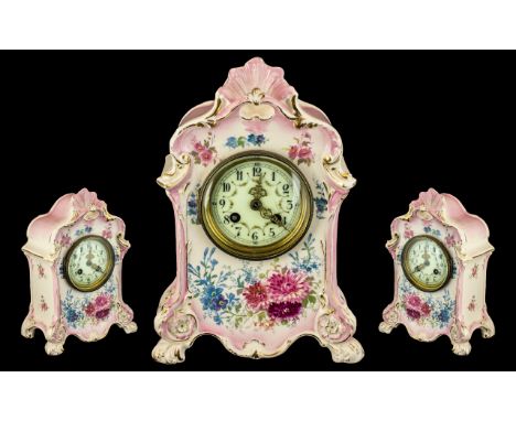 Porcelain Mantle Clock, made in Germany by Bonn, in pink floral decorated porcelain with gilt highlights. Porcelain clock fac