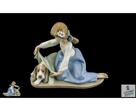 Lladro - Hand Painted Porcelain Figure ' Dogs Best Friend ' Model No 5688. Designer Antonio Ramos. Issued 1990 - 2005. Height