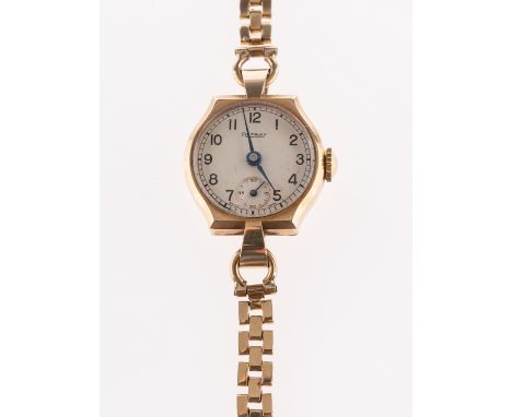 Rotary, a 9ct gold wristwatch, the movement having a lever escapement and marked 810, the matt-silvered dial having black Ara