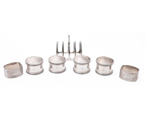  A mixed group of silver including; a set of four napkin rings by Brook & Son, Sheffield 1929, a pair of Birmingham named nap