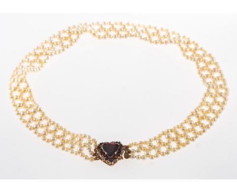 A pearl choker necklace, a lattice style choker necklace made up of small cultured pearls, pearls approx. 3.0mm to 3.5mm, to 