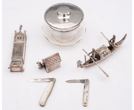 A mixed group of English, Hanau and Dutch silver including; a Birmingham silver and glass dressing table powder bowl 1911, of