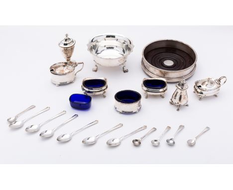 A mixed group of silver including; an Elizabeth II decanter coaster by William Comyns &amp; Sons Ltd, London 1970, a set of s