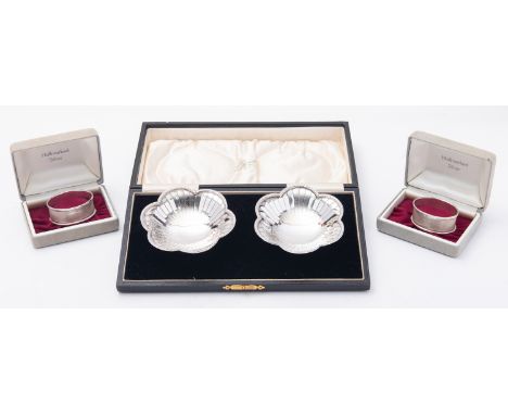 A cased pair of George V silver bon bon dishes by Adie Brothers Ltd, Birmingham 1931, of lobbed form, 9.5cm wide, and a cased