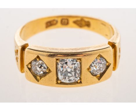 An antique three stone ring, square set to the centre with a cushion-cut diamond, diamond approx. 0.50 carat, set each side w