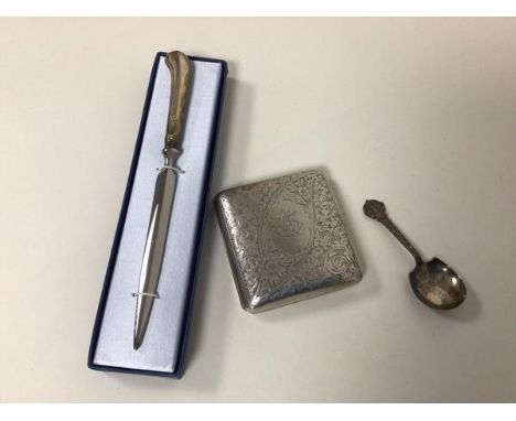 An Edwardian Birmingham silver cigarette case with foliate engraved exterior (115.73g) and a silver handled letter opener wit
