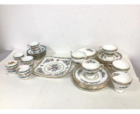 A 1930s/40s Foley bone china Ming Rose pattern part tea service with four teacups, six saucers, sugar bowl, milk jug, side pl