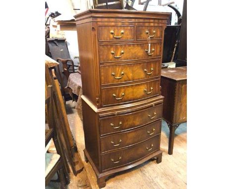 A mahogany Siesta of Newcastle and Carlisle and NH Chapman &amp; Co. Ltd. reproduction Georgian style chest on chest, the bow