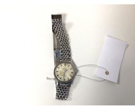 A vintage Omega Constellation chronometer automatic gentleman's stainless steel wristwatch with silvered dial and baton hour 
