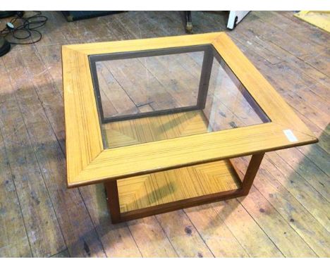 A 1960's - 70's  teak vintage square coffee table with central glass top with matching quarter veneered wooden plinth base (4