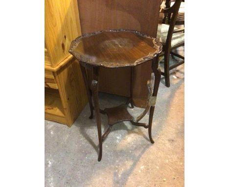 A mahogany occasional table with circular foliate edged top on cabriole supports united by undertier (a/f) (68cm x 39cm)