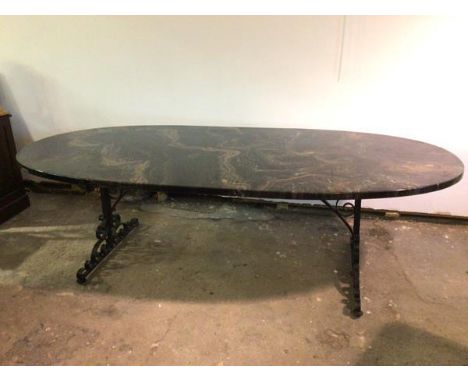 A modern dining table with marble effect resin tablet shaped top on C scroll metal base (78cm x 275cm x 132cm)