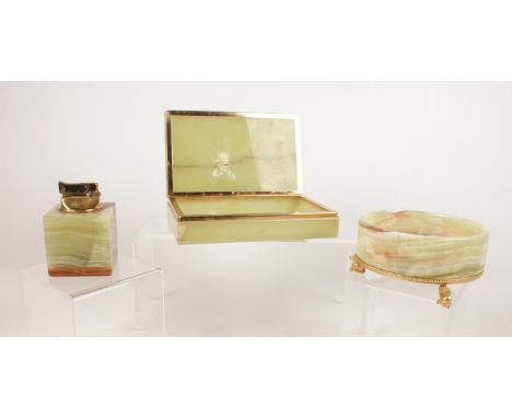 Three pieces of onyx - to include a cubed lighter, a hinged trinket box and circular dish mounted upon three dolphin feet. Li