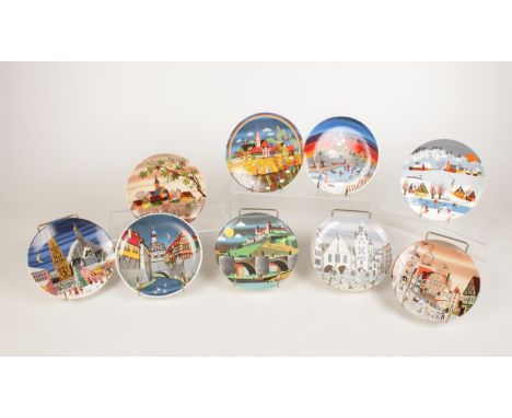 A collection of nine Poole Pottery plates - comprising of  six scene plates &amp; three season plates ( 426 Summer II, 427 Au