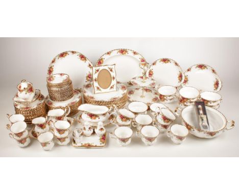 A large collection of Royal Albert 'Old Country Roses' tea/coffee/dinner set. Comprising of a two tier cake stand, a teapot, 