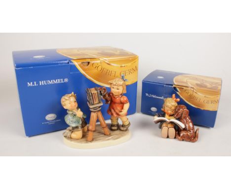 Two boxed Goebel Hummel figures. One 'Camera Ready' and the other 'Proud Moments', both with boxes and COA.  