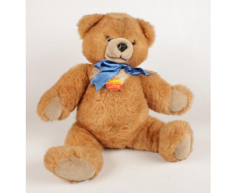 A Steiff Molly teddy bear, with ear button and maker's tags, 55cm high.  