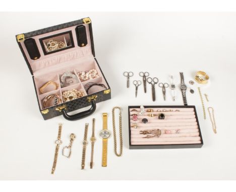 An assortment of costume jewellery presented in a small briefcase. Comprising of two gold plated ladies Rotary wrist watches,