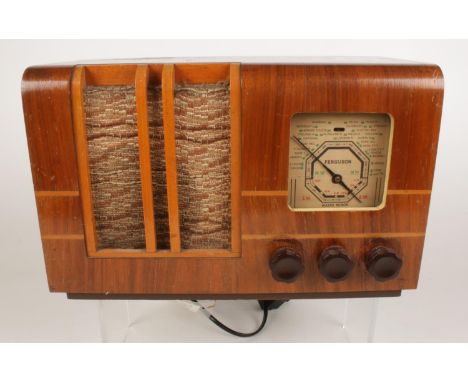 A Ferguson 1940's vintage wooden cased valve radio. Model no 909U, Serial no 13468. H: 20.5cm, W: 33cm, D: 16.5cm.  Condition