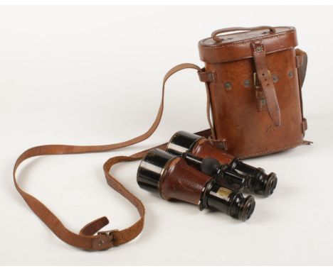 A cased pair of world war one British Army Officers binoculars. Binoculars stamped Mk. V Spl 53591. Cased marked J Cripps 191