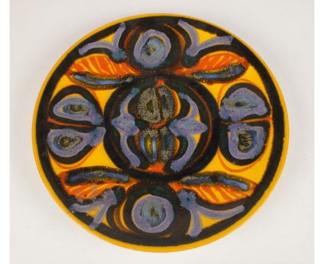 A Poole Pottery charger. (37cm diameter)  