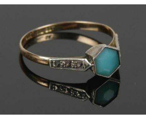 A vintage 9ct gold and silver ring, set with a turquoise paste stone, size M.  