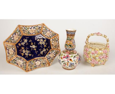 A Zsolnay pierced ceramic pink &amp; yellow floral basket along with a similar pierced border blue ground dish and a bottle s