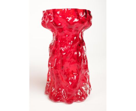 A 'Whitefriars' style ruby red bark textured vase. H:15cm.  Condition good. Just slight nibbles around the lip, nothing major