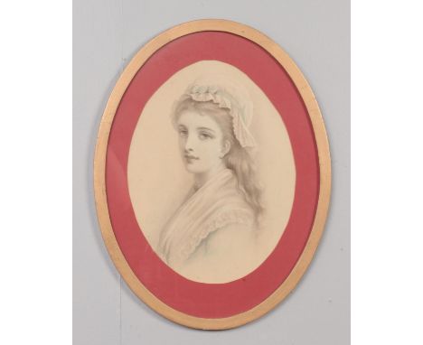 Pair of framed oval soft pencil drawings heightened with watercolour / gouache, Portrait studies of two young maidens. 30cm x
