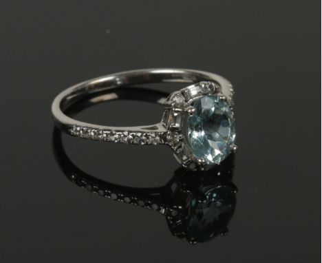 A 9ct white gold Aquamarine &amp; diamond ring. Size V  
